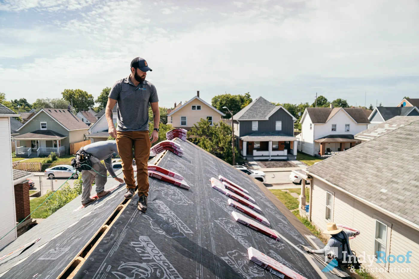 Tarping and dry-in on a Chatham Hills commercial roof